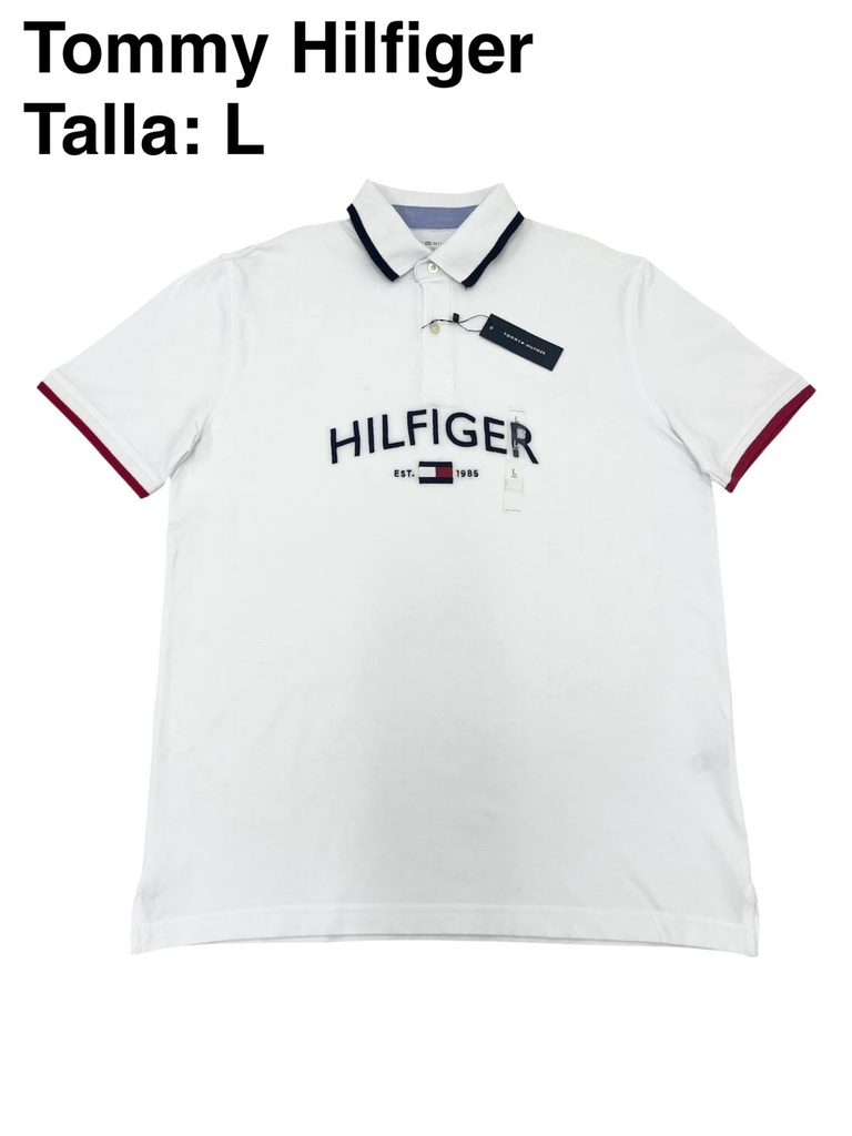 Playera Tommy Hilfiger blaca con un gráfico de la marca bordada en el pecho talla L