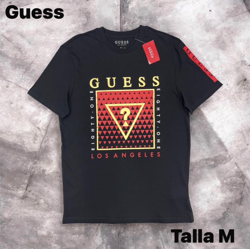 Playera GUESS negra con estampado gráfico frontal en rojo y amarillo talla m